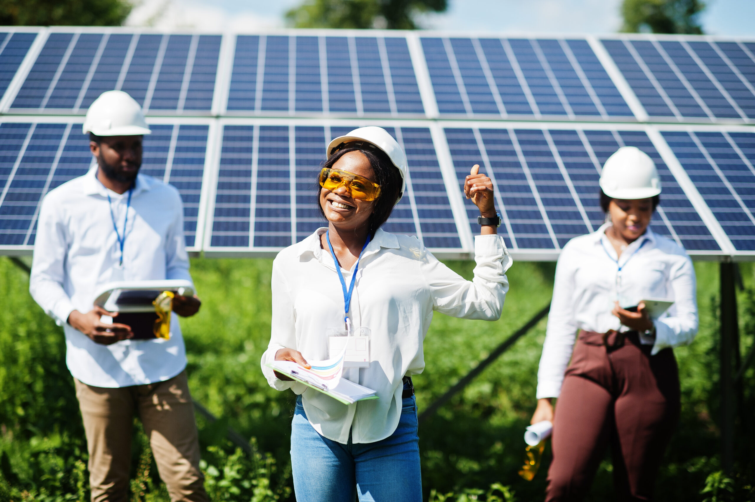 african american technician checks the maintenance of the solar